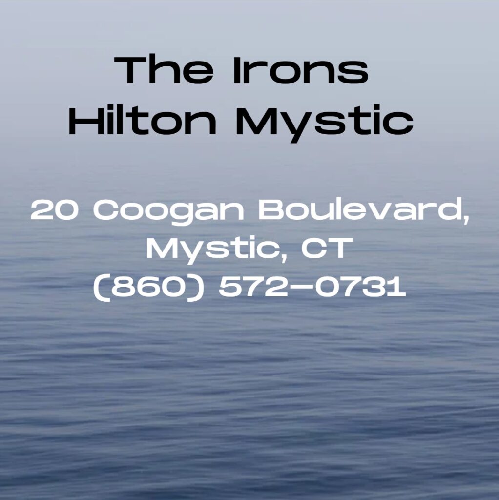 The Irons Hilton Mystic at the Aquarium, With over two dozen rotating craft beers on tap, an impressive whiskey selection, and a warm ambiance featuring reclaimed wood, fireplaces, and communal tables, The Irons is a favorite for both locals and visitors seeking casual excellence and social dining in downtown Mystic.